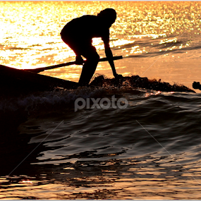 Fisherman on Move  by Tapesh Mukherjee - People Street & Candids