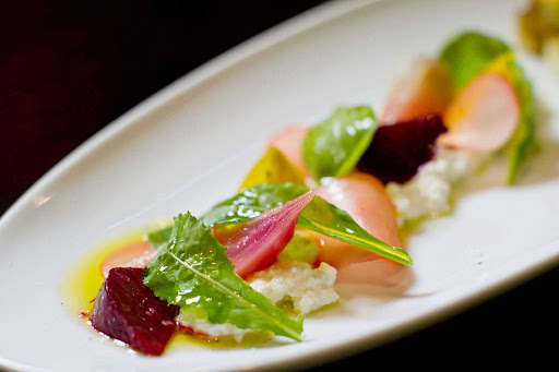 150-Central-Park-Royal-Caribbean-appetizer-2 - A goat cheese, beets and micro-greens salad served at Oasis of the Seas' 150 Central Park restaurant.