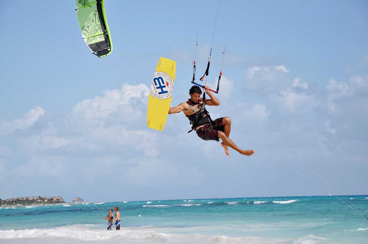 Ever want to try kiteboarding? It's a new extreme sport that combines windsurfing, paragliding and wakeboarding. 