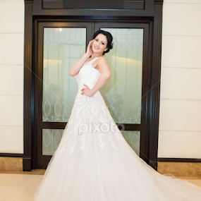 Wedding dress is both an intimate and personal for a woman by Paul Padurariu - Wedding Bride