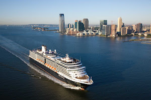 An aerial view of Eurodam sailing past New York. The Holland America ship cruises to the Caribbean as well as the Baltic Sea, Norwegian fjords, Northern Atlantic and Atlantic Canada/New England.