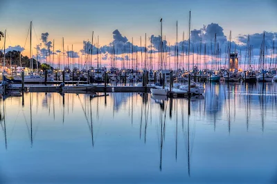 Fishing at sunrise at the pier in St. Petersburg, Florida.