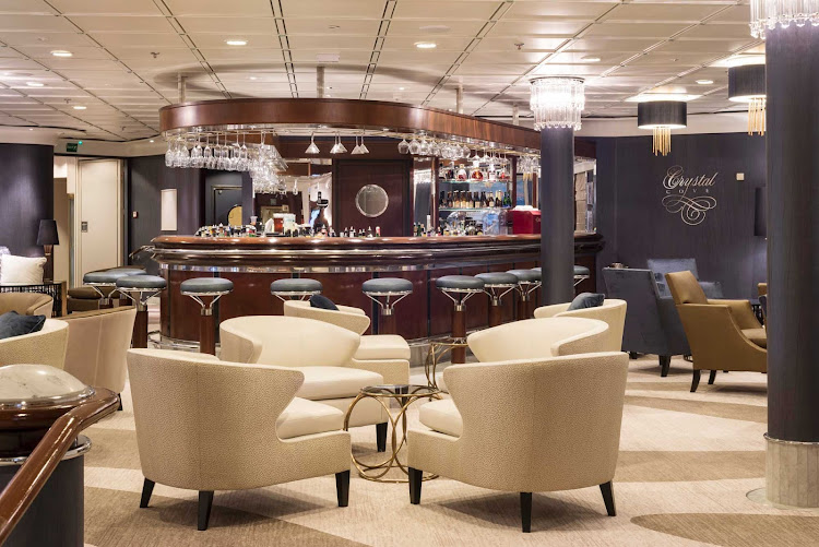 Grab a drink and meet new people at the newly refurnished and upgraded Cove Bar aboard Crystal Symphony.