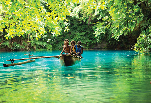 Kids-Locals-Blue-Hole-Vanuatu - Visit the Blue Hole when you sail to Espiritu Santo, the largest island of Vanuatu, Melanesia, with Silver Discoverer.