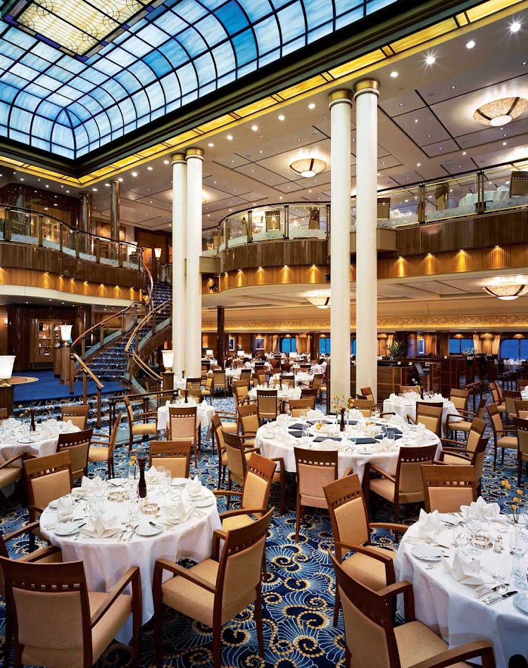 Dine in the elegantly designed Britannia Restaurant for a night to remember while sailing on Queen Mary 2.
