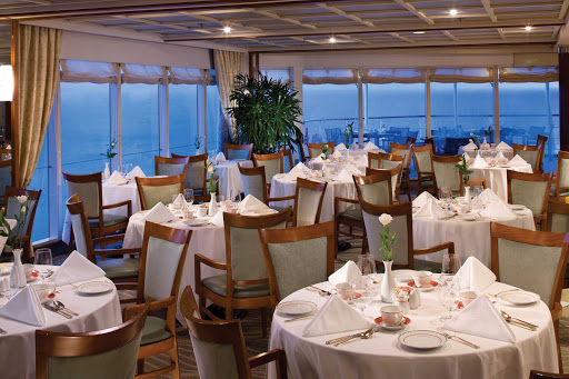 Dine in  La Veranda Restaurant to enjoy regional specialties while appreciating the view as you sail aboard Seven Seas Mariner.