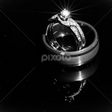 Wedding Rings On Piano by Craig Lybbert -  