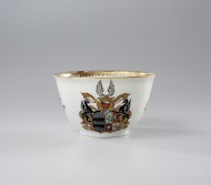 Bell-shaped cup and spoon tray with the arms of the Van Reede van Oudtshoorn and Boesses family