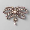 Bow brooch