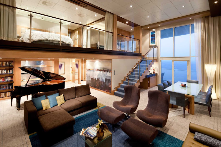The Royal Loft Suite aboard Oasis of the Seas offers guests a two-story room with panoramic views, a master bath and bedroom, twin beds that convert to a Royal King bed, separate bathroom, a private balcony and whirlpool, spacious dining room  and more.