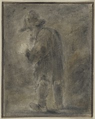 Staande man met hoed