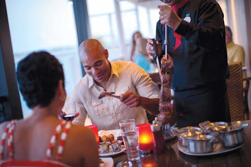 Take your partner to Norwegian Breakaway's specialty restaurant Moderno Churascaria, where you both can enjoy delicious roasted meats carved at tableside.