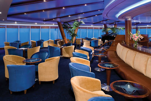 The Observation Lounge on deck 12 offers impeccable views as you travel on Seven Seas Mariner.