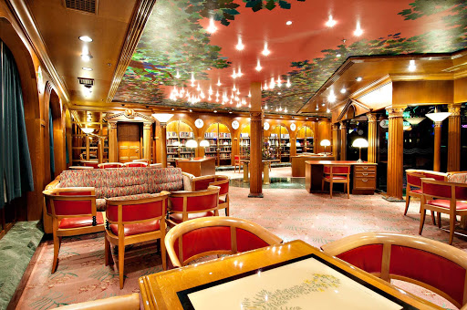 Carnival-Sensation-Oak-Room-Library - Spend some quiet time with a good book at Carnival Sensation's Oak Room Library. 