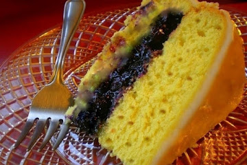 Monet&#39;s Mango Surprise: Lemon Pecan Spice Cake filled with Blueberries and Mango