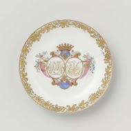 Saucer from the 'Swellengrebel service' with a double crowned monogram and a border with floral scrolls