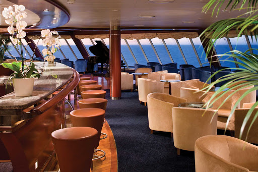 Head to the Observation Lounge for some primo vantage points to take in the spectacular views as you travel aboard Seven Seas Voyager.