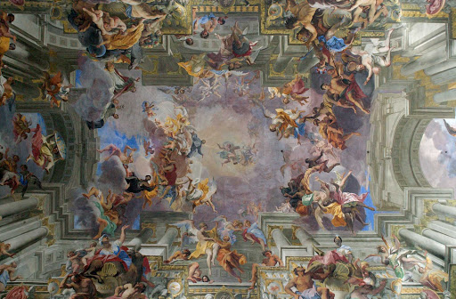 Church-of-Sant'Ignazio-Rome - Andrea Pozzo executed this vault fresco in Rome's Church of Sant'Ignazio in 1694 celebrating the success of the missionary activities of the Society of the Jesuits. (The light of the Gospel illuminating the four corners of the world.)   