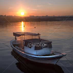 Alone in Golden Horn by Mustafa Çetinkaya - Landscapes Sunsets & Sunrises