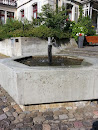 Brunnen zur reformierten Kirche