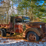 Rusting Chevy by Alan Roseman -  