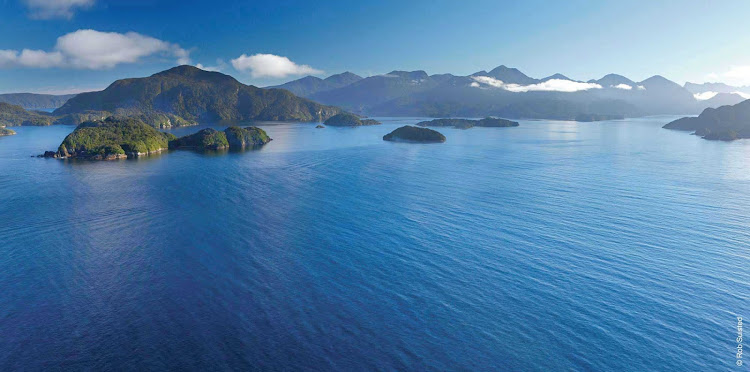 Silver Discoverer takes you through beautiful Dusky Sound in Fiordland National Park when you sail to New Zealand.
