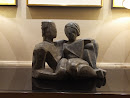 Man and Woman Relaxing Statue