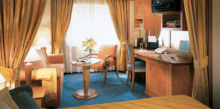 Silversea's Vista Suite offers a sitting area with plenty of space for relaxing and a writing desk if the mood strikes you.