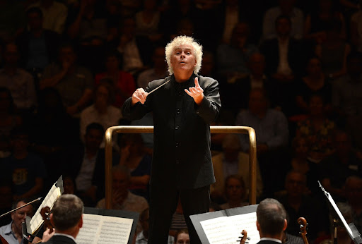 Simon Rattle conducting the London Symphony Orchestra