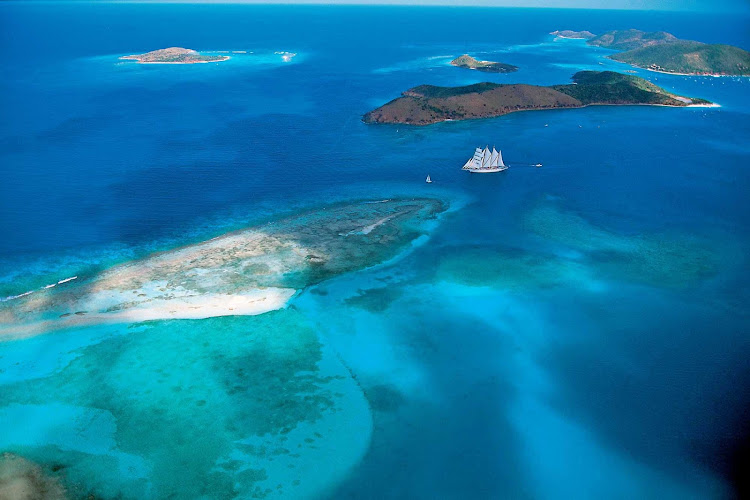 Cruise the turquoise waters of the Caribbean aboard Star Clipper (shown here) or its identical sister ship, Star Flyer.