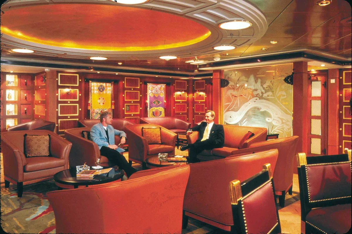 Adventure-of-the-Seas-Connoisseurs-Club - If you're a smoker, head to the Connoisseurs Cigar Club aboard Adventure of the Seas to smoke your choice of top-of-the-line cigars.