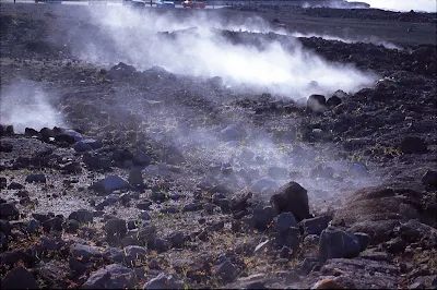 Vapor rises along the trail at Halemaumau Crater, an active volcano on the Big Island of Hawaii. 
