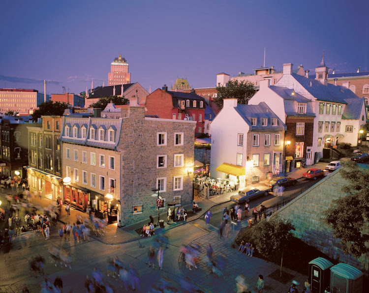 Locals and visitors get bustling in Quebec City at dusk.