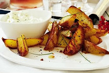Crispy potato skins with creamy chive dip