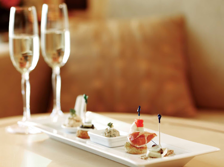 Enjoy fine champagne and canapes while cruising on one of Cunard's luxury cruise ships.