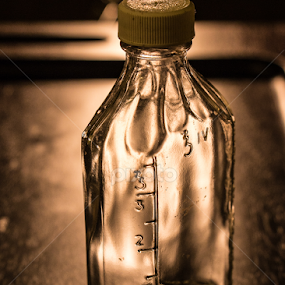 bottle aglow by Elsie Nisonen - Artistic Objects Glass
