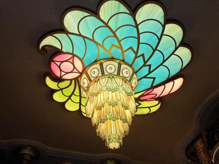 The chandelier above the atrium aboard Disney Fantasy. 