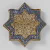 Star-shaped tile with floral scrolls