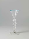 Kelkglas met een holle stam met baluster en drie bollen