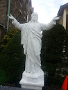 Jesus Welcomes You Statue