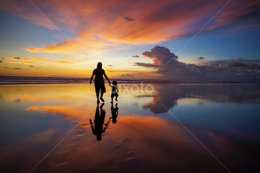 Into the Sunset by Wei Fuk Lie - People Street & Candids