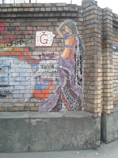 Mosaic of Woman on the Wall