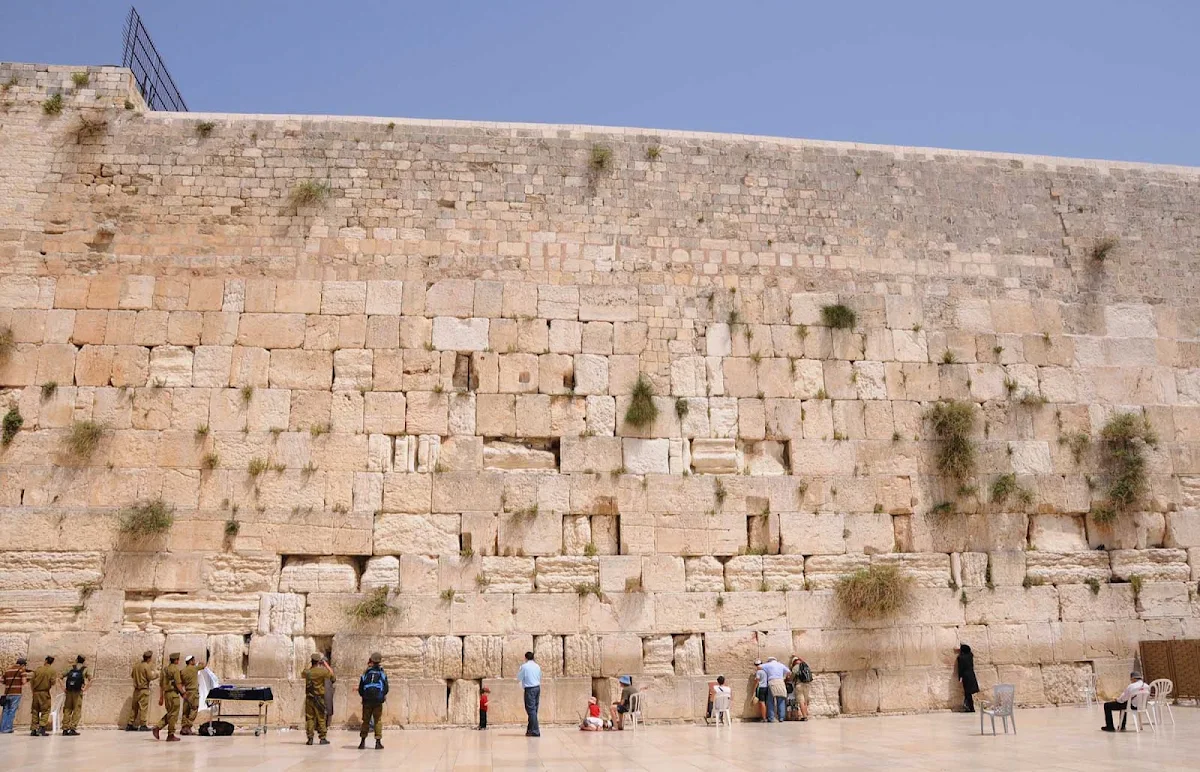 Western-Wall - Israeli soldiers, Israelis and visitors mingle and pray at the Western Wall in Old Jerusalem. 