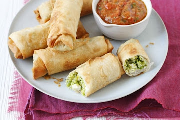 Pea, feta & quinoa spring rolls with roast tomato nam prik