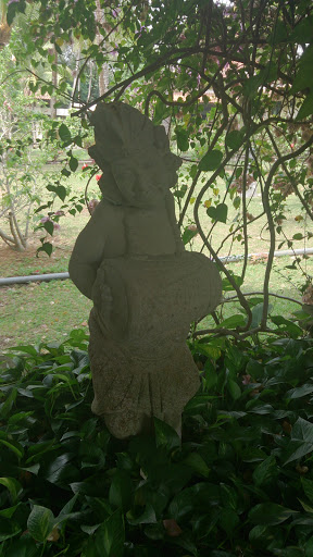 Stone Statue With Musical Instrument