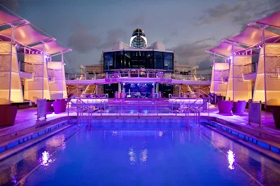 The main pool of Celebrity Silhouette at dusk. The ship is just as impressive in the evening as it is during the day.