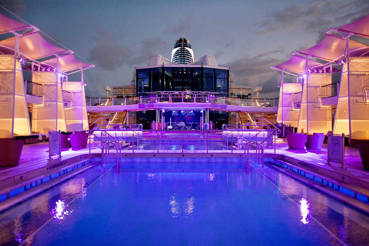 The main pool of Celebrity Silhouette at dusk. The ship is just as impressive in the evening as it is during the day.