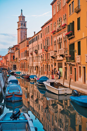 Venice-canal-at-dusk - A painterly scene of Venice at dusk. The City of Canals is one of the destinations on a Tere Moana cruise.