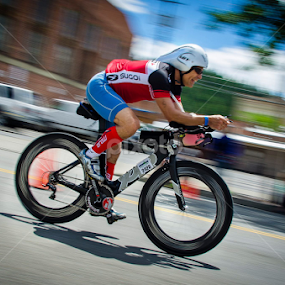 At the Ironman in Coeur D'Alene today. The idea was to capture the rider while panning the camera and blur the background. It took a while to get adjusted to the speed of the bikes. I liked this one. by Clement Stevens - Uncategorized All Uncategorized