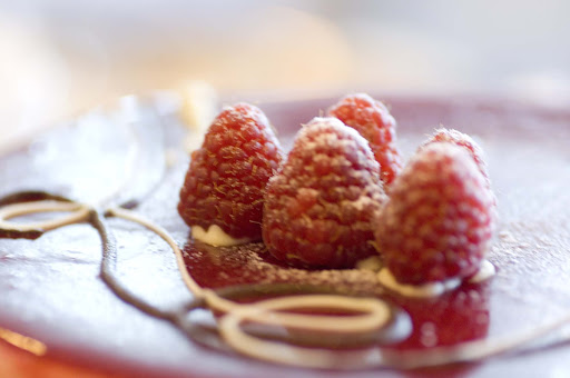 A raspberry dessert creates a smooth finish to your culinary experience on Crystal Symphony.